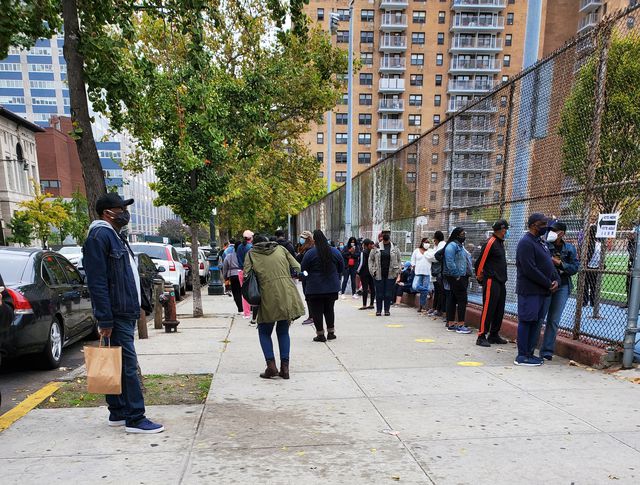Lines of voters in Harlem, outside a playground